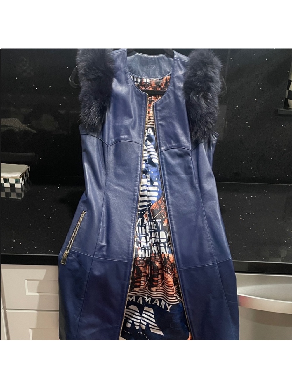 Genuine lambskin leather vest in navy color.